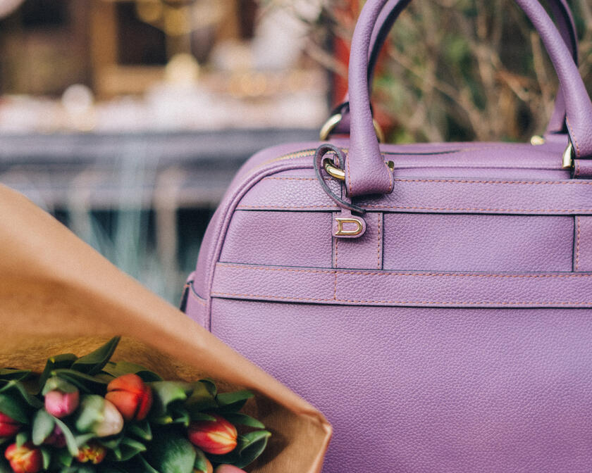 Handbag with bunch of tulips