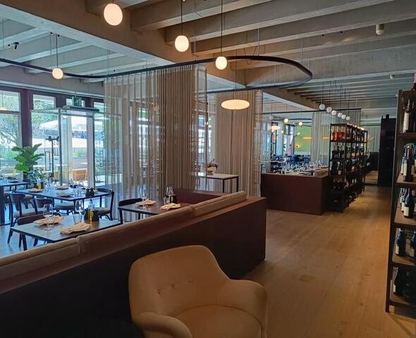 Industrial interior with concrete ceiling and wooden floor