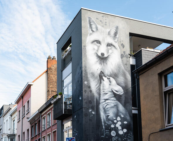 Mural of two foxes in black and white