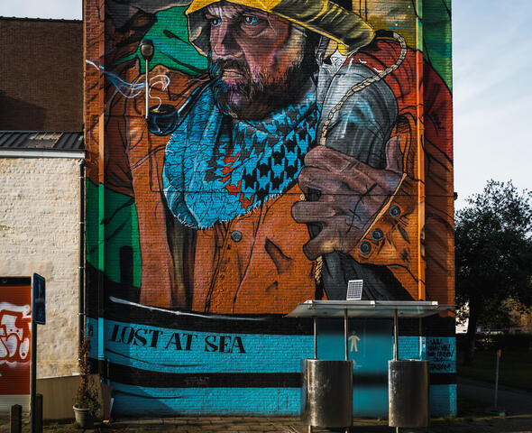 Colourful mural of a sailor by Klaas Van der Linden