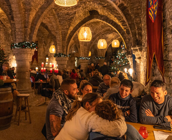 People at a table in a winter bar