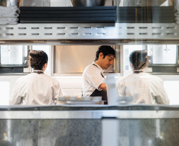 Chef in the kitchen of OAK restaurant