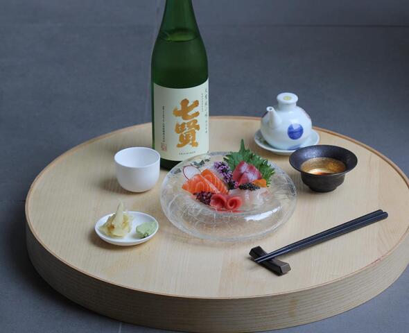 Plate with Japanese dish and sake