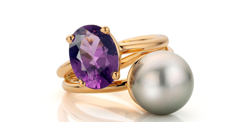 Golden ring with gemstone