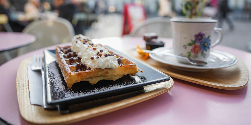 Waffle and coffee on a terrace