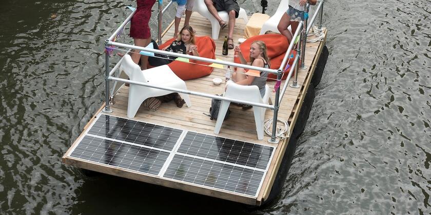6 people toast on a raft
