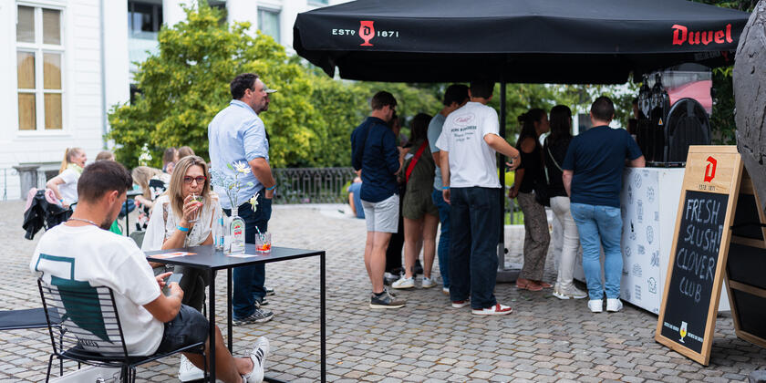 People on the terrace of a summer bar
