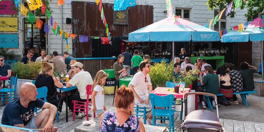 People on the terrace of a summer bar
