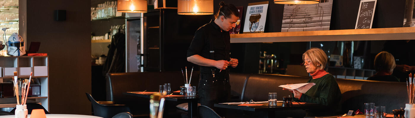 Woman ordering in a restaurant