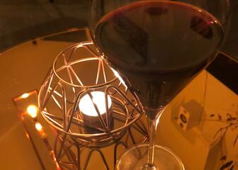 Wine glass and candle light