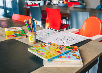 Children can colour or play during their visit