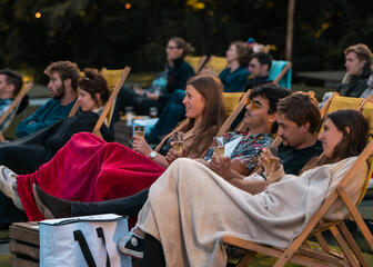 Audience under a blanket
