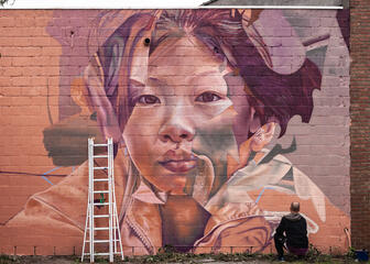 Street art Telmo Miel at the Chinastraat in Ghent