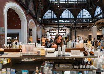 Tiany takes a look at some beauty items while shopping in Ghent