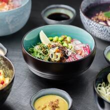 Colourful bowls with food