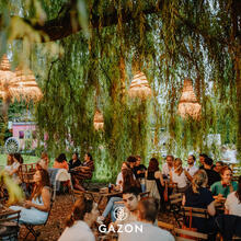 Cosy dining under the weeping willow